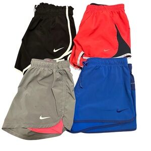 Nike Woman’s Dri-FIT running/training shorts in various colors set of 4 size M